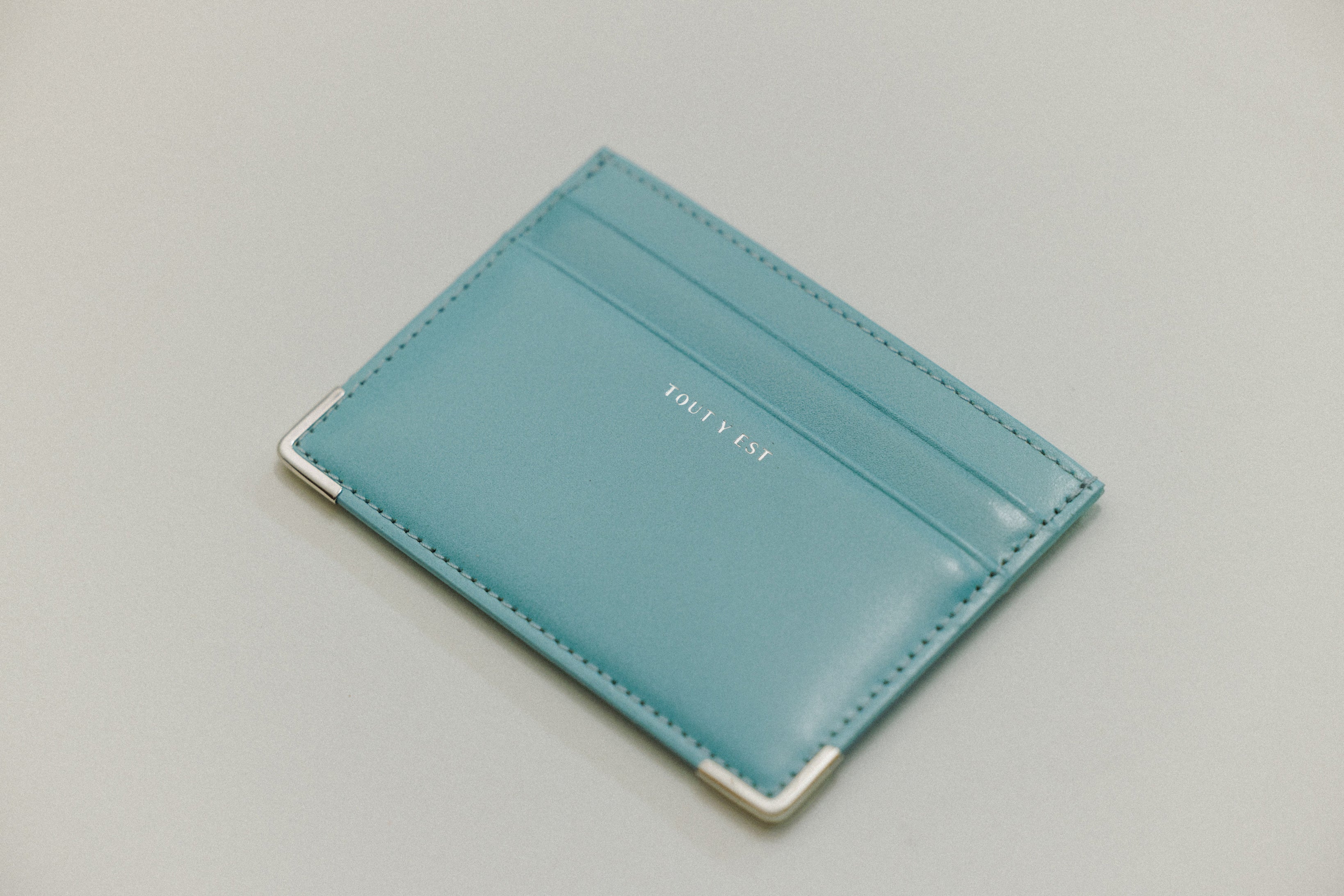 PORTE CARTES ANGLES TURQUOISE – TOUT Y EST