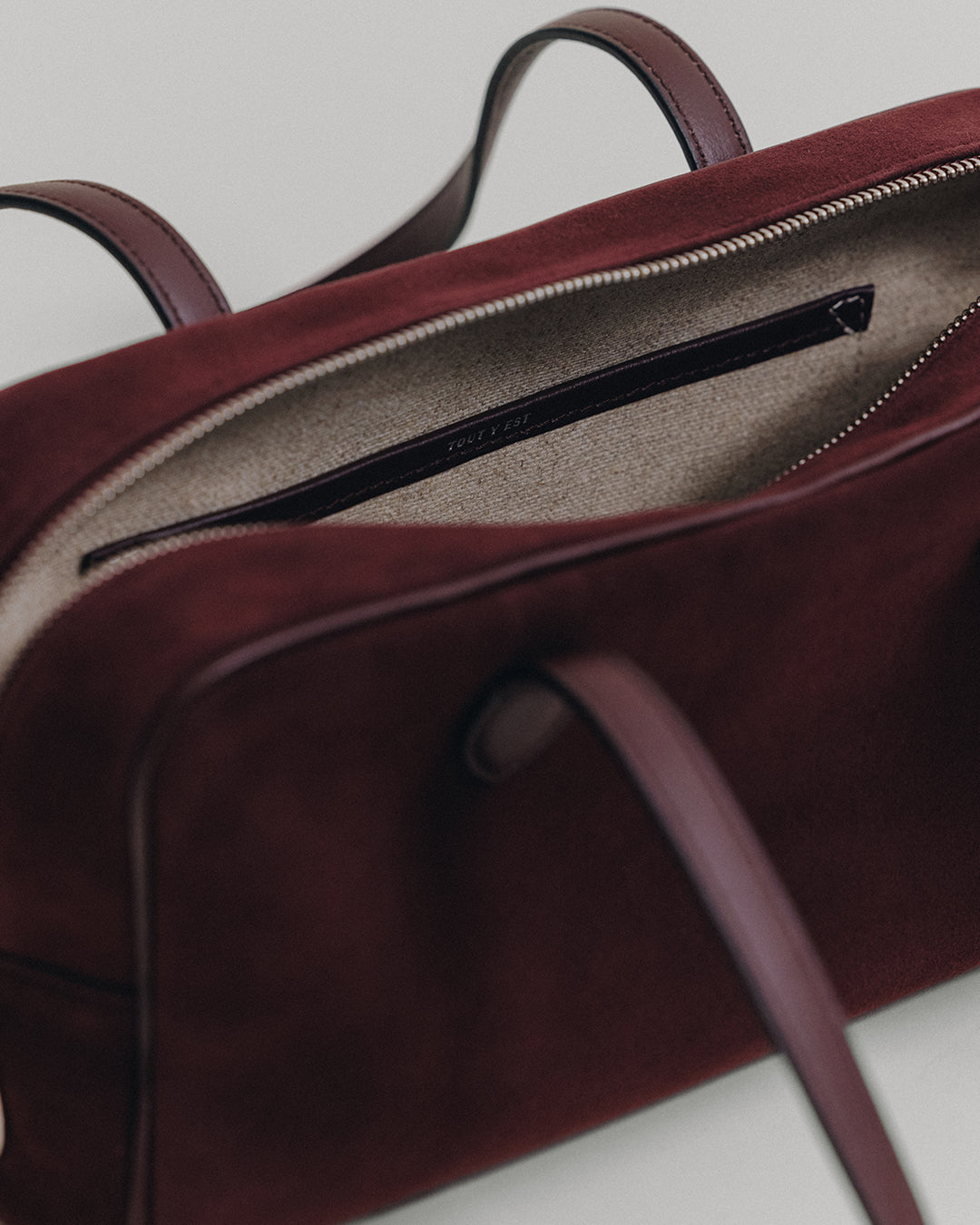 SAC LOQUET SMALL SUEDE BURGUNDY